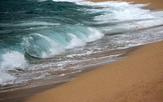 Big wave crashing towards the shore, Beautiful photo. Slightly soft focus.