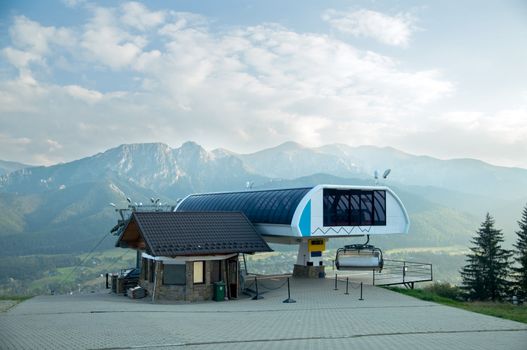 A chair-lift in Tatra Mountains. Fresh morning scene