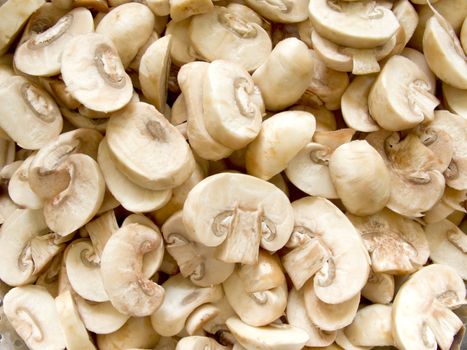 Pile of fresh sliced Champignon Mushroom close up