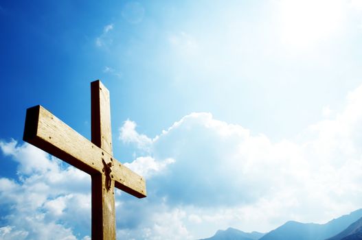 Cross on the blue sky. Religion, christian concepts