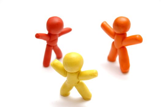 3 plasticine figures staying together and celebrating