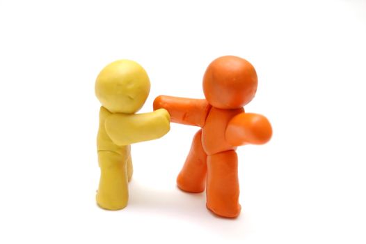 2 plasticine figures agreement and handshake