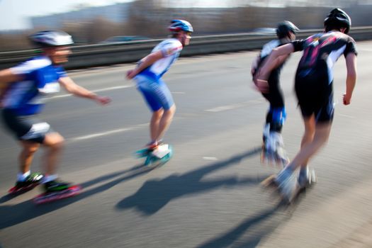 Roller blades skating race, competition. Fast motion