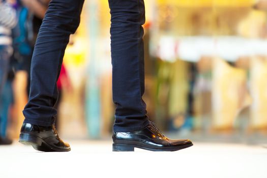 Elegant man shoes close up in a shopping mall, centre. Fashion, luxury