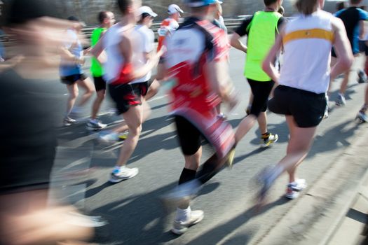 Running fast in marathon. Sport, competition, energy.