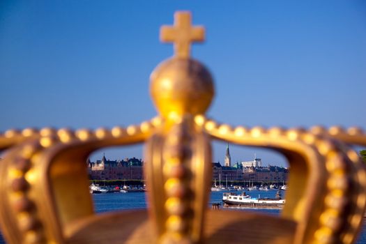 Stockholm, Sweden in Europe. Crown in the foreground, waterfront view on architecture