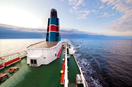 Ship deck, board view. Ocean, sea at sunset