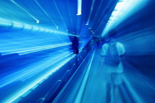 People rush in subway. Conceptual motion blur, fast pace of life