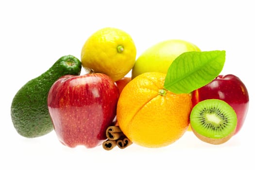 kiwi, avocado, apples, orange, lemon, and cinnamon, isolated on white