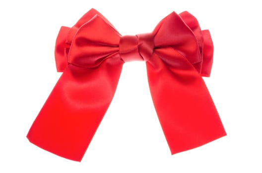 Red ribbon bow isolated on white background.