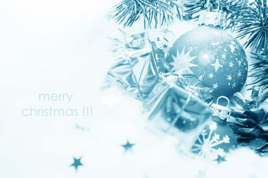 Christmas balls frozen in soft cotton wool resembling snow