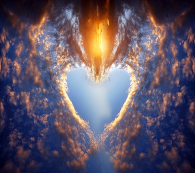 Heart shape made of clouds on a sunset sky. Love, romance, religion concepts