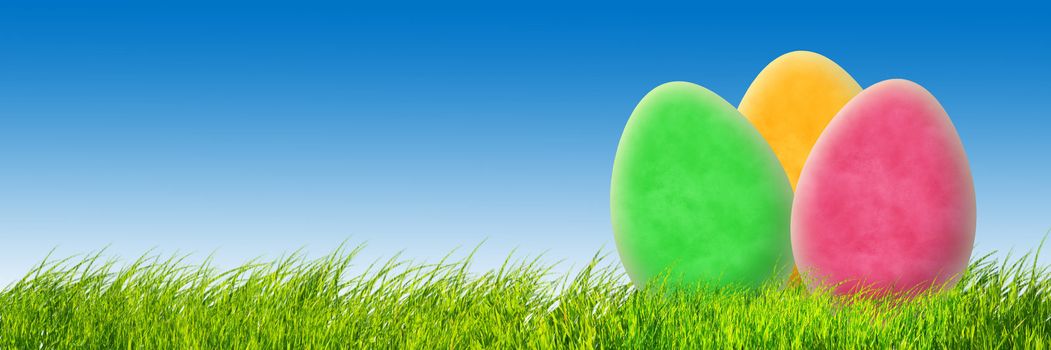 Perfect easter background. Colorful easter eggs and blue sky