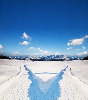 Two ways choice. Snowy winter landscape and mountains