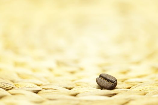 coffee beans on a wicker mat
