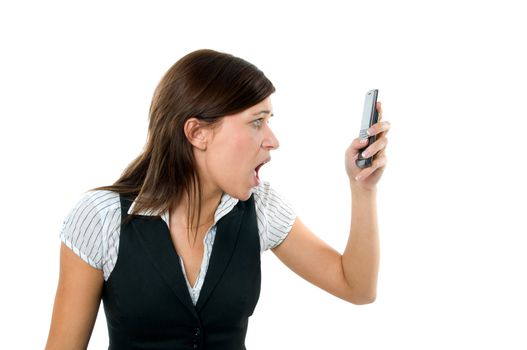 Angry businesswoman shouting to a mobile. Isolated on white