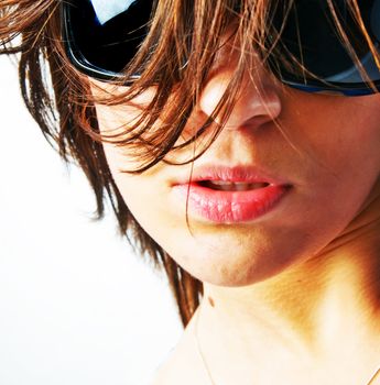 Beautiful girl with big glasses in sunlight