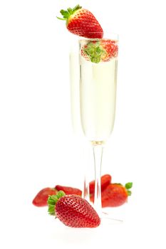 a glass of champagne and strawberries