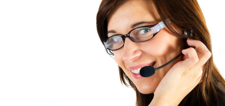 Friendly customer service agent smiling during telephone conversation