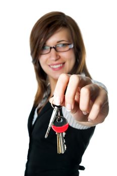 Smiling developer gives keys to new home. Isolated on white background