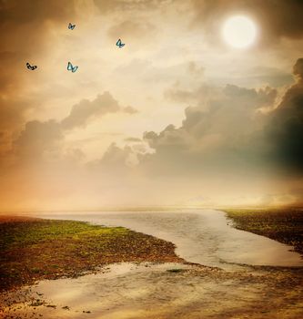 Butterflies and moon in sepia colored fantasy landscape