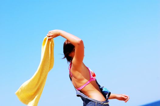 Young attractive woman enjoying summertime