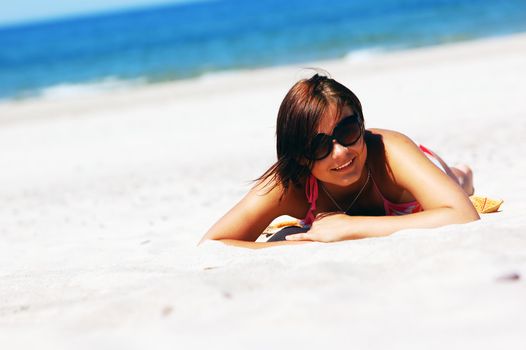 Beautiful woman relaxing on the beach