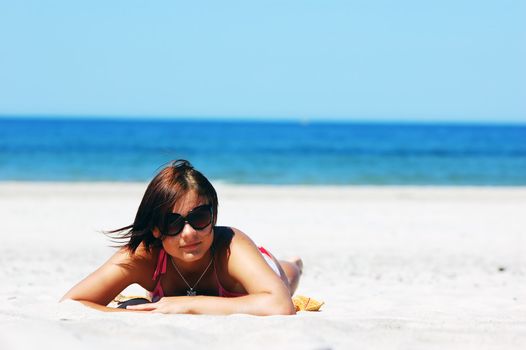 Beautiful woman relaxing on the beach