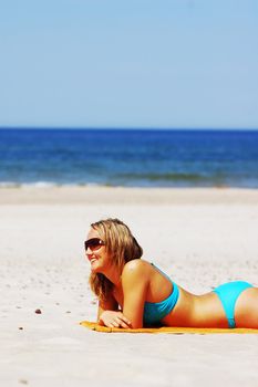 Beautiful woman relaxing on the beach