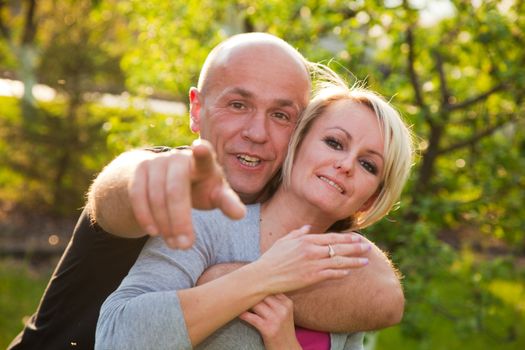 Portrait of an adult happy couple together outdoors