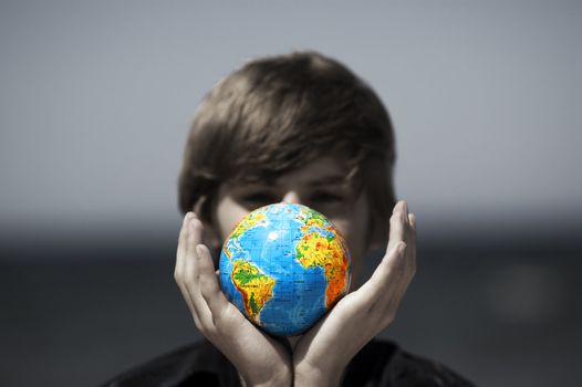 Earth globe in hands protected. Ideal for Earth protection concepts, recycling, world issues, enviroment themes