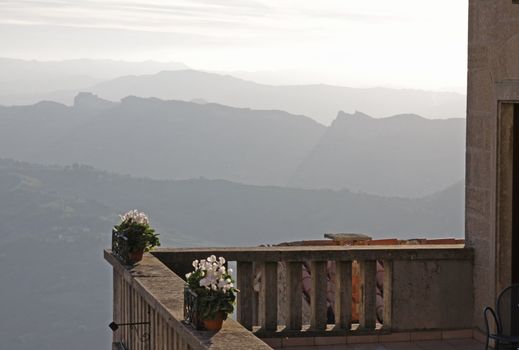 A hotel balcony looking out over the rolling hills of the Republic of San Marino.