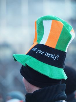 COPENHAGEN - MAR 17: Man with colourful hat at the annual St. Patrick's Day celebration and parade in front of Copenhagen City Hall, Denmark on March 17, 2013.