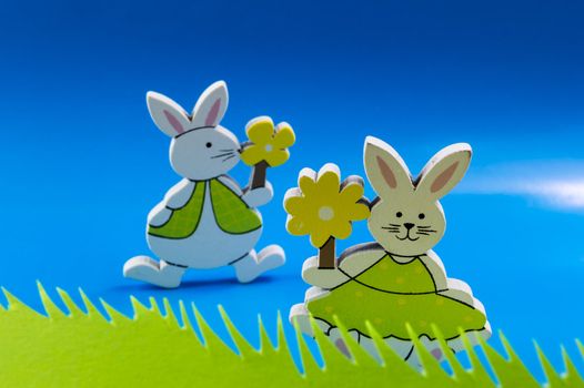 Easter bunnies on blue background