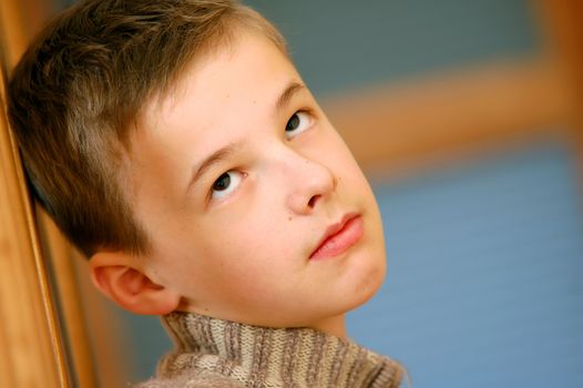 Portrait of young boy thinking