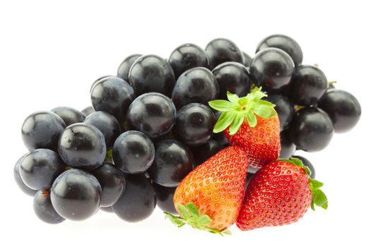 bunch of grapes and strawberries isolated on white