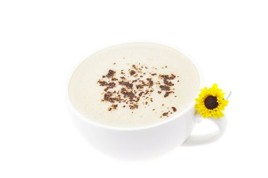 cappuccino and a flower isolated on white