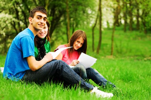 Highschool students learning together outdoor