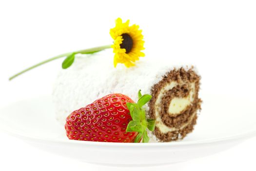 flower, cake and strawberries isolated on white