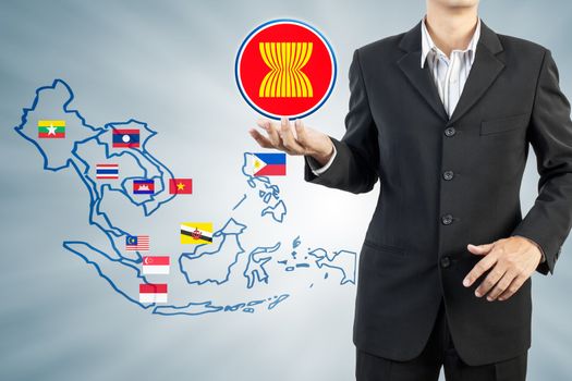 ASEAN Economic Community in businessman hand