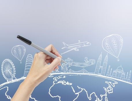 hand drawing the dream travel around the world