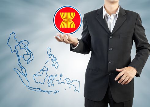 ASEAN Economic Community in businessman hand