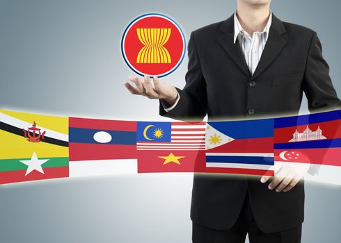 ASEAN Economic Community in businessman hand