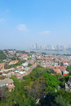 Aerial image of a modern city by a river 