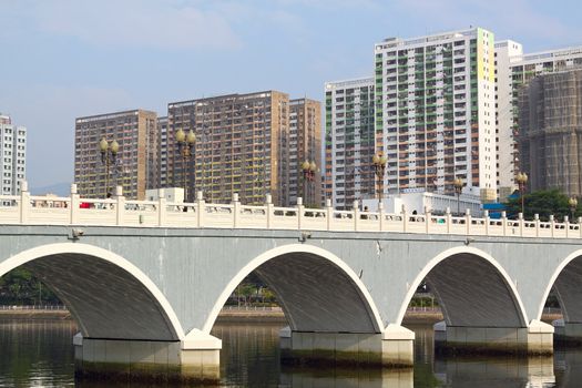 Arch bridge in asia downtown area, hong kong