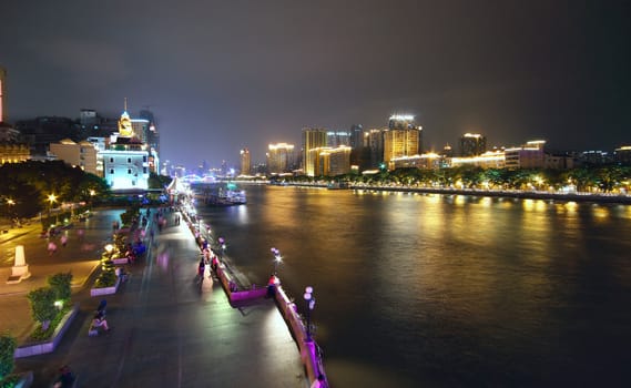 Aerial image of a modern city by a river 