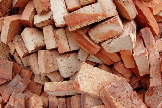 heap of red brick at day 