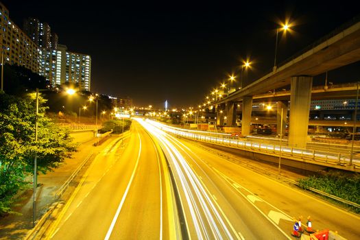 Highway at night in modern city 