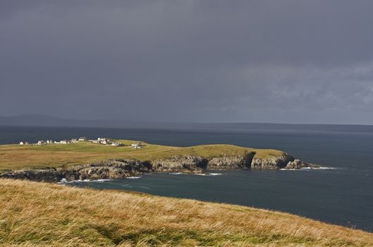 coastal landscape on scottish isle with wetland and hills