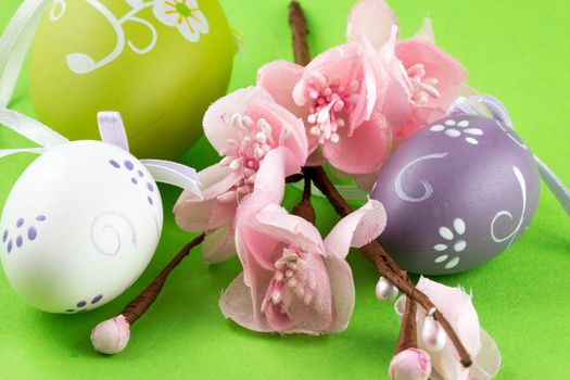 Easter eggs and a branch of peach tree
